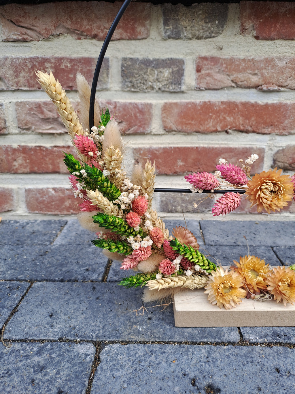 Ring staand met droogbloemen