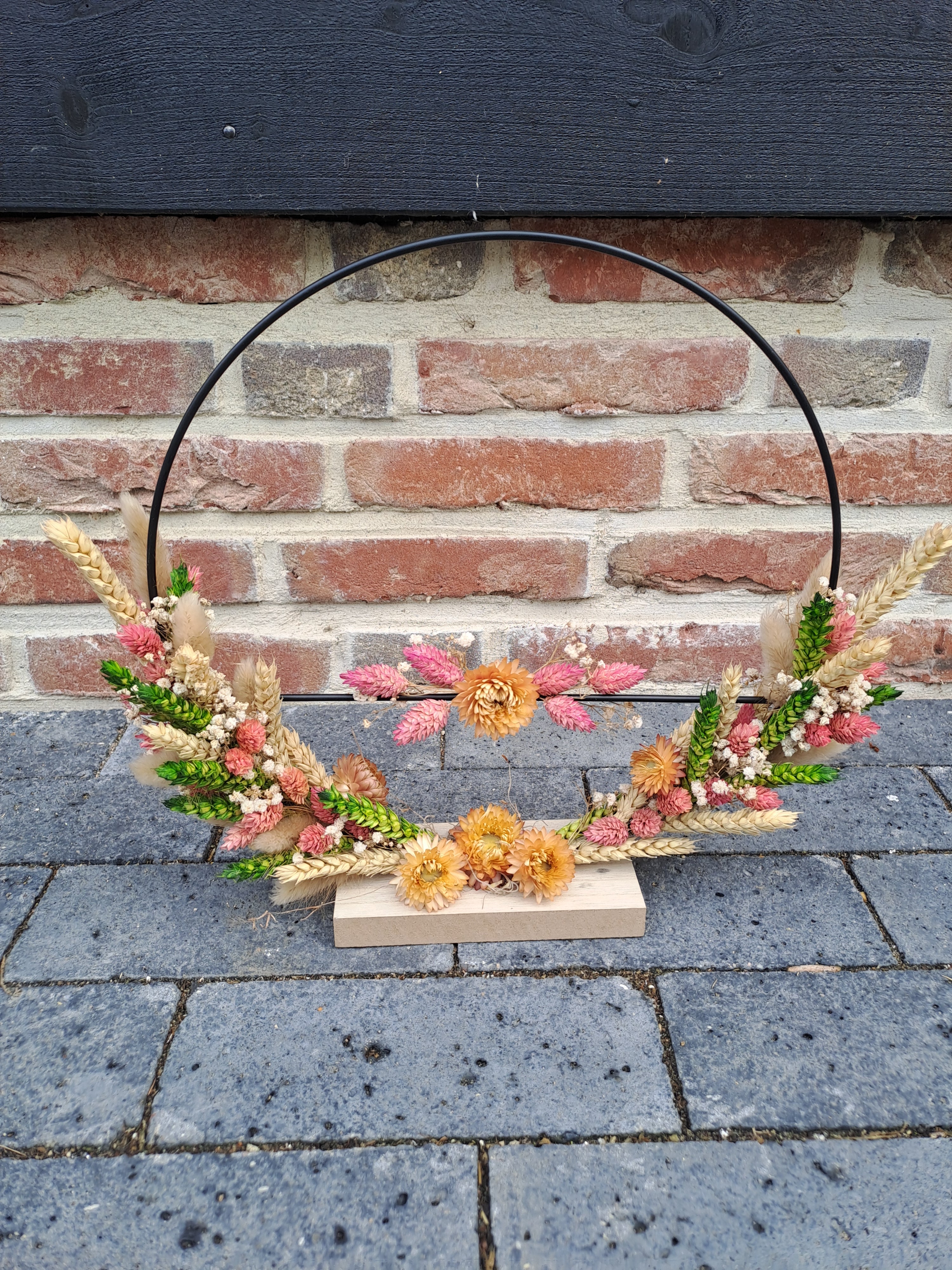 Ring staand met droogbloemen
